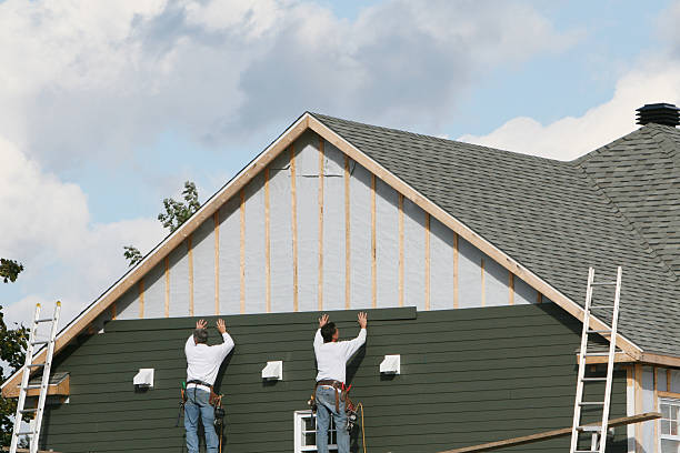 Professional Siding Replacement technician working in East Springfield, OH